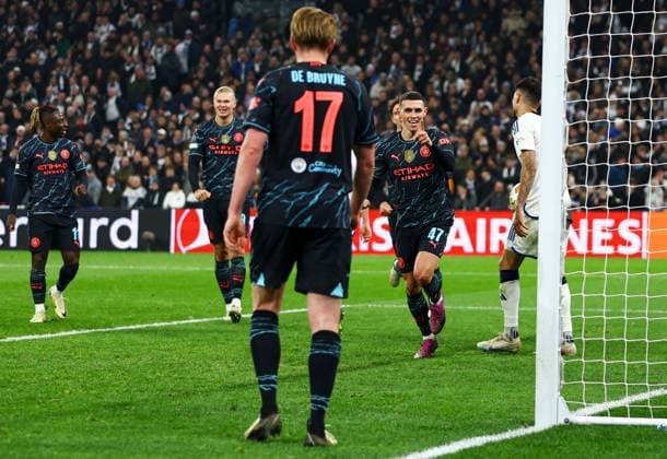 Phil Foden of Manchester City celebrates scoring for their side to make it 3-1 FC Copenhagen v Manchester City, UEFA Champions League, Round of 16, First Leg, Football, Parken Stadium, Copenhagen, Denmark - 13 Feb 2024 EDITORIAL USE ONLY No use with unauthorised audio, video, data, fixture lists, club league logos or live services. Online in-match use limited to 120 images, no video emulation. No use in betting, games or single club league player publications. Copyright: xKieranxMcManus Shutterstockx 14343227cv