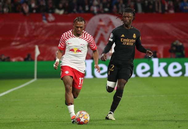 13 02 2024, xgox, Football UEFA Champions League 1 8 Final, RB Leipzig Real Madrid emspor, v l Lois Openda RB Leipzig , Eduardo Camavinga Real Madrid DFL DFB REGULATIONS PROHIBIT ANY USE OF PHOTOGRAPHS as IMAGE SEQUENCES and or QUASI VIDEO Leipzig