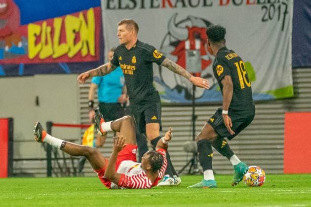 Leipzig, Germany 13 December 2023 Champions League 2023 2024 RB Leipzig vs Real Madrid Pictured from left Lois Openda Leipzig , Toni Kroos Madrid and Aurelien Tchouameni Madrid Copyright: xFotostandx xNachtigallx