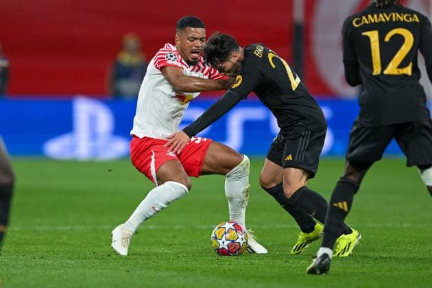 Champions League RB Leipzig Real Madrid on 13 02 2023 at the Red Bull Arena in Leipzig Benjamin Henrichs RB Leipzig in a duel against Brahim Diaz Real Madrid MT