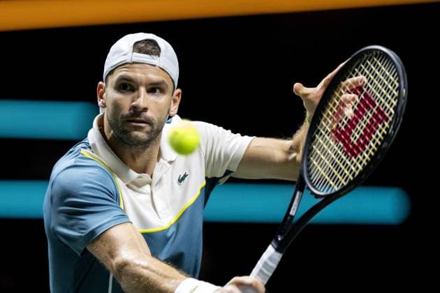 ROTTERDAM - Grigor Dimitrov (BUL) in action against Lorenzo Sonego (ITA) on the third day of the ABN AMRO Open tennis tournament in Ahoy. ANP SANDER KONING Third day 2024 xVIxANPxSportx xxANPxIVx 491099728 originalFilename: 491099728.jpg