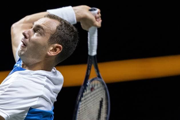 ROTTERDAM - Roman Safiullin (RUS) in action against Holger Rune (DEN) on the third day of the ABN AMRO Open tennis tournament in Ahoy. ANP SANDER KONING Third day 2024 xVIxANPxSportx xxANPxIVx 491103048 originalFilename: 491103048.jpg