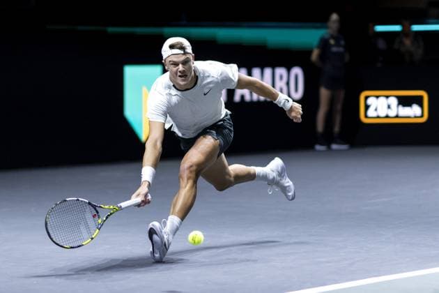 ROTTERDAM - Holger Rune (DEN) in action against Roman Safiullin (RUS) on the third day of the ABN AMRO Open tennis tournament in Ahoy. ANP SANDER KONING Third day 2024 xVIxANPxSportx xxANPxIVx 491103555 originalFilename: 491103555.jpg