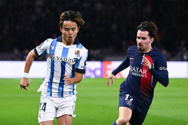 Takefusa Kubo ( 14 - Real Sociedad ) and Vitinha Vitor Machado ( 17 - PSG ) during the UEFA Champions League match between PSG and Real Sociedad at Parc Des Princes on February 14, 2024 in Paris, France. ( Photo by federico pestellini panoramic ) - FOOTBALL : Paris Saint Germain vs Real Sociedad - Ligue des Champions - 14 02 2024 FedericoPestellini Panoramic 