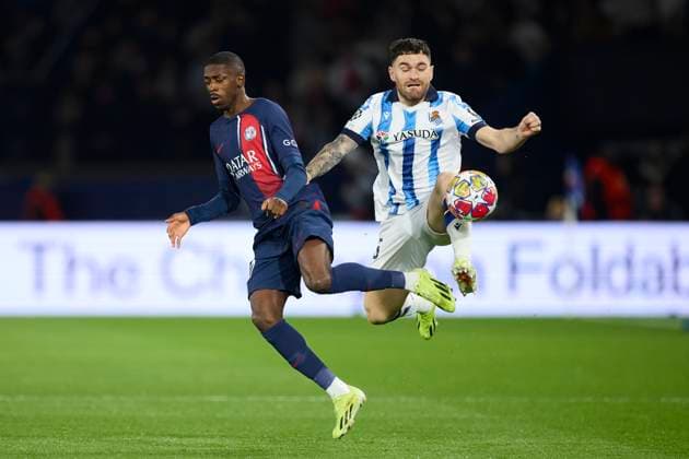 Paris Saint-Germain v Real Sociedad: Round of 16 Leg One - UEFA Champions League 2023 2024 Ousmane Dembele of Paris Saint-Germain competes for the ball with Javi Galan of Real Sociedad during the UEFA Champions League match between Paris Saint-Germain and Real Sociedad at Parc des Princes on February 14, 2024, in Paris, France. Paris Parc des Princes Paris France RL_PSGvRSO_036 Copyright: xRicardoxLarreinax