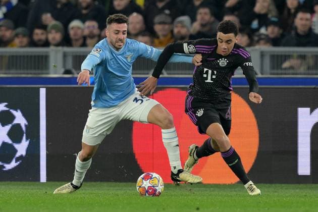 Foto Alfredo Falcone LaPresse 14 Febbraio 2024 Roma (Italia) calcio - Lazio vs Bayern Monaco - Andata ottavi di finale Uefa Champions League 2023 2024 - Stadio Olimpico di Roma. Nella foto: Mario Gila (SS Lazio); Jamal Musiala (Bayern Monaco); February 14, 2024 Rome (Italy) sport, soccer - SS Lazio vs FC Bayern Munich - Round of 16 first leg Uefa Champions League 2023 2024 - Olimpic Stadium in Rome. In the pic: Mario Gila (SS Lazio); Jamal Musiala (Bayern Monaco);  Copyright: xAlfredoxFalcone LaPressex