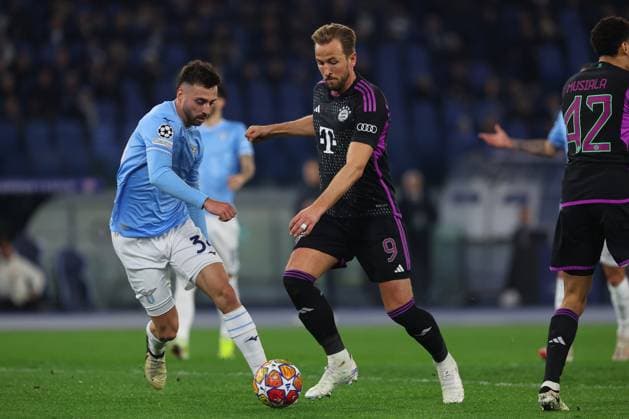 UEFA CHAMPIONS LEAGUE 2023-2024 - Round 16 - SS Lazio vs Bayern Munchen, Olympic Stadium in Rome Rome, Italy 14.2.2024: Maria Gila of Lazio , Harry Kane of Bayern Munchen in action during the Uefa Champions League 2023-2024, round of 16 football match SS Lazio vs FC Bayern Mucnhen at Olympic Stadium in Rome. Rome Olympic italy italy Copyright: xmarcoxiacobucci