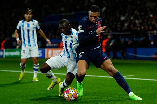 Paris Saint-Germain v Real Sociedad: Round of 16 First Leg - UEFA Champions League 2023 24 Kylian Mbappe Centre-Forward of PSG and France and Hamari Traore right-back of Real Sociedad and Mali compete for the ball during the UEFA Champions League 2023 24 round of 16 first leg match between Paris Saint-Germain and Real Sociedad at Parc des Princes on February 14, 2024 in Paris, France. Paris France  Copyright: xJosexBretonx originalFilename:breton-parissai240214_np7hk.jpg
