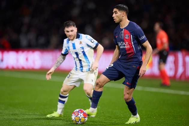 Paris Saint-Germain v Real Sociedad: Round of 16 Leg One - UEFA Champions League 2023 2024 Achraf Hakimi of Paris Saint-Germain competes for the ball with Javi Galan of Real Sociedad during the UEFA Champions League match between Paris Saint-Germain and Real Sociedad at Parc des Princes on February 14, 2024, in Paris, France. Paris Parc des Princes Paris France RL_PSGvRSO_055 Copyright: xRicardoxLarreinax