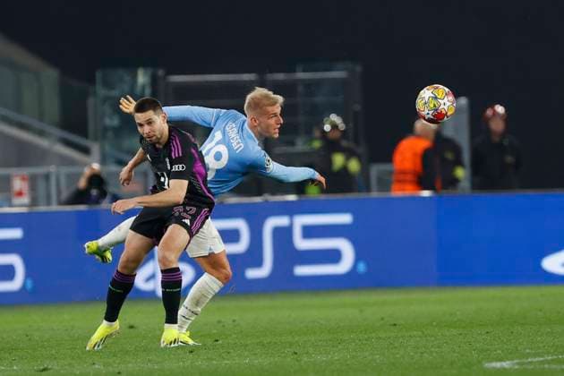 February 14, 2024, Rome, Lazio, Italy: Gustav Isaksen of Lazio RaphaoÂ«l Guerreiro of Bayern during the UEFA Champions League round of 16 first leg match between SS Lazio and FC Bayern at Stadio Olimpico on February 14, 2024 in Rome, Italy. Rome Italy - ZUMAl131 20240214_zsp_l131_016 Copyright: xCiroxDexLucax