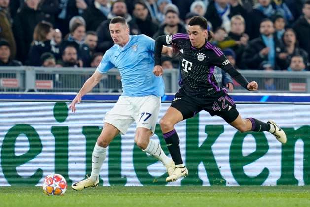 Adam Marusic of SS Lazio competes for the ball with Jamal Musiala of FC Bayern Munchen during the Uefa Champions League match between SS Lazio and FC Bayern Munchen at Stadio Olimpico Rome Italy on 14 February 2024. Rome Stadio Olimpico Rome Italy Copyright: xPhotoxSportxPicsx SP24-849-032