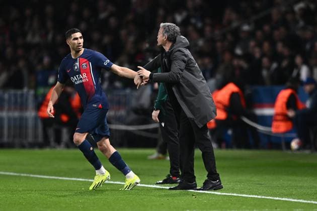 PARIS, FRANCE - FEBRUARY 14: Luis Enrique, the manager and Achraf Hakimi of Paris Saint-Germain during the UEFA Champions League 2023 24 round of 16 first leg match between Paris Saint-Germain and Real Sociedad at Parc des Princes on February 14, 2024 in Paris, Paris Saint-Germain v Real Sociedad: Round of 16 First Leg - UEFA Champions League 2023 24 Copyright: xSebastianxFrejx