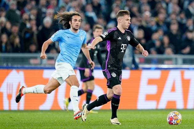 Lazio v FC Bayern Munich - UEFA Champions League Joshua Kimmich of FC Bayern Munich and Matteo Guendouzi of SS Lazio compete for the ball during the UEFA Champions League Round of 16 match between SS Lazio v FC Bayern Munich at Stadio Olimpico Roma on February 14, 2024 in Rome, Italy. Rome Stadio Olimpico Rome Italy Copyright: xGiuseppexMaffiax UCL_Lazio-BayernMunich_GM_140224_LIA9553