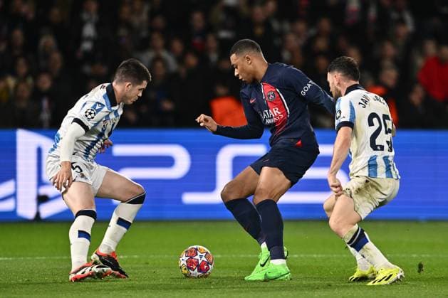 PARIS, FRANCE - FEBRUARY 14: Kylian Mbappe of Paris Saint-Germain and Igor Zubeldia, Javi Galan of Real Sociedad during the UEFA Champions League 2023 24 round of 16 first leg match between Paris Saint-Germain and Real Sociedad at Parc des Princes on February 14, 2024 in Paris, Paris Saint-Germain v Real Sociedad: Round of 16 First Leg - UEFA Champions League 2023 24 Copyright: xSebastianxFrejx