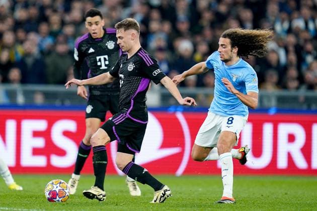 Lazio v FC Bayern Munich - UEFA Champions League Joshua Kimmich of FC Bayern Munich and Matteo Guendouzi of SS Lazio compete for the ball during the UEFA Champions League Round of 16 match between SS Lazio v FC Bayern Munich at Stadio Olimpico Roma on February 14, 2024 in Rome, Italy. Rome Stadio Olimpico Rome Italy Copyright: xGiuseppexMaffiax UCL_Lazio-BayernMunich_GM_140224_LIA9967