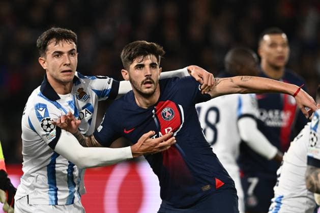 PARIS, FRANCE - FEBRUARY 14: Martin Zubimendi of Real Sociedad and Lucas Beraldo of Paris Saint-Germain during the UEFA Champions League 2023 24 round of 16 first leg match between Paris Saint-Germain and Real Sociedad at Parc des Princes on February 14, 2024 in Paris, Paris Saint-Germain v Real Sociedad: Round of 16 First Leg - UEFA Champions League 2023 24 Copyright: xSebastianxFrejx