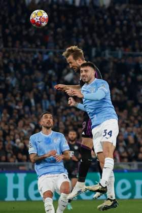 14th February 2024, Stadio Olimpico, Rome, Italy; Champions League Football, Round of 16, First Leg; Lazio versus Bayern Munich; Harry Kane of Bayern wins the header from Fuentes Mario Gila of Lazio  ActionPlus12608995 NaFoto