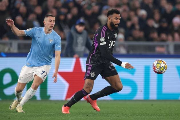 Rome, Italy, 14th February 2024. Eric-Maxim Choupo-Moting of Bayern München takes on Adam Marusic of SS Lazio during the UEFA Champions League match at Olimpico, Rome. Picture credit should read: Jonathan Moscrop Sportimage EDITORIAL USE ONLY. No use with unauthorised audio, video, data, fixture lists, club league logos or live services. Online in-match use limited to 120 images, no video emulation. No use in betting, games or single club league player publications. SPI-2933-0047