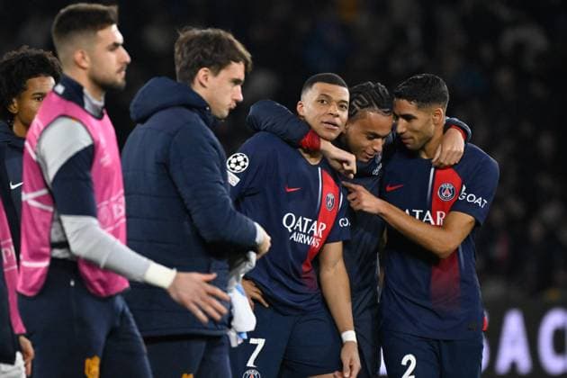 Kylian Mbappe ( 7 - PSG ) - Ethan Mbappe ( 38 - PSG ) and Achraf Hakimi ( 2 - PSG ) celebrate their side s victory after during the UEFA Champions League match between PSG and Real Sociedad at Parc Des Princes on February 14, 2024 in Paris, France. ( Photo by federico pestellini panoramic ) - FOOTBALL : Paris Saint Germain vs Real Sociedad - Ligue des Champions - 14 02 2024 FedericoPestellini Panoramic 