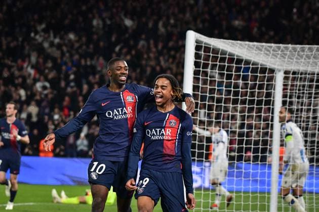 Champions League - PSG v Real Sociedad Paris Saint-Germain s forward Bradley Barcola (R) celebrates scoring a goal during the UEFA Champions League football match between Paris Saint-Germain and Real Sociedad at the Parc des Princes stadium in Paris, France on February 14, 2024. Photo by Firas Abdullah ABACAPRESS.COM Paris Ã?le-de-France France  Copyright: xAbdullahxFiras ABACAx