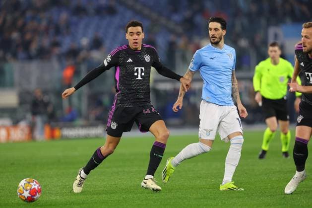 Rome, Italy 14.2.2024: Luis Alberto of Lazio , Jamal Musiala of Bayern Munchen in action during the Uefa Champions League 2023-2024, round of 16 football match SS Lazio vs FC Bayern Mucnhen at Olympic Stadium in Rome.  Copyright: xMarcoxIacobucci IPAxSportx xipa-x xx IPA_43441362 IPA_Agency_IPA43441362