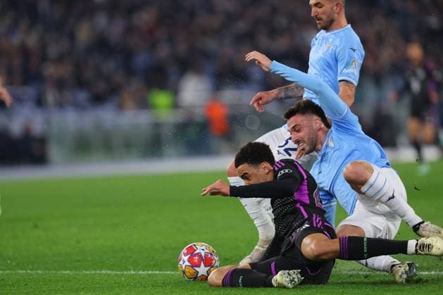 Rome, Italy 14.2.2024: Jamal Musiala of Bayern Munchen, Maria Gila of Lazio in action during the Uefa Champions League 2023-2024, round of 16 football match SS Lazio vs FC Bayern Mucnhen at Olympic Stadium in Rome.  Copyright: xMarcoxIacobucci IPAxSportx xipa-x xx IPA_43441533 IPA_Agency_IPA43441533