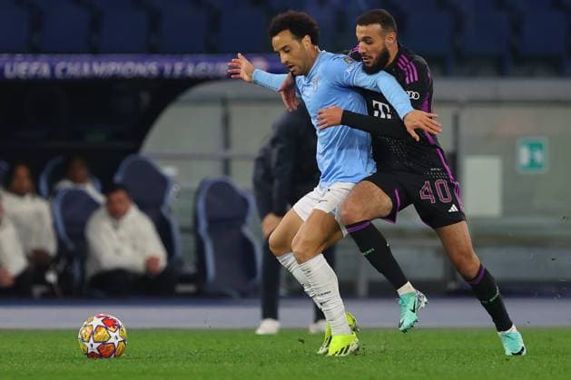 Rome, Italy 14.2.2024: Felipe Anderson of Lazio , Noussair Mazraoui of Bayern Munchen in action during the Uefa Champions League 2023-2024, round of 16 football match SS Lazio vs FC Bayern Mucnhen at Olympic Stadium in Rome.  Copyright: xMarcoxIacobucci IPAxSportx xipa-x xx IPA_43441537 IPA_Agency_IPA43441537