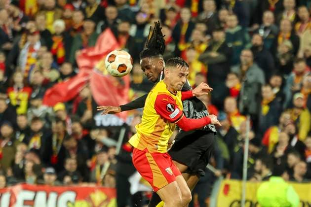Jordy Makengo SC Freiburg, 33 and Ruben Aguilar RC Lens, 02 in header duel , Football, UEFA Europa League, Play off 1 match, 2023 2024, RC Lens vs SC Freiburg, 15 02 2024, Stade Bollaert Delelis, Lens, France Lens Stade Bollaert Delelis Pas de Calais France Copyright: xGrantxHubbsx
