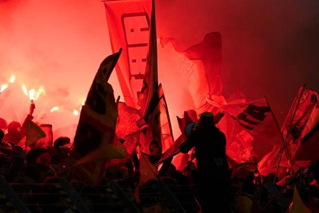 Fans of Lens during let off flares during the UEFA Europa League match between Racing Club Lens and SC Freiburg at Stade Felix Bollaert on February 15, 2024 in Lens, France. ( Photo by federico pestellini panoramic ) - FOOTBALL : Lens vs Fribourg - Europa League - 15 02 2024 FedericoPestellini Panoramic 