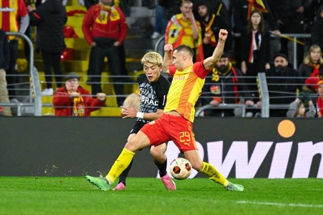 Ritsu Doan ( 42 - Fribourg ) and R Aguilar ( 2 - Lens ) during the UEFA Europa League match between Racing Club Lens and SC Freiburg at Stade Felix Bollaert on February 15, 2024 in Lens, France. ( Photo by federico pestellini panoramic ) - FOOTBALL : Lens vs Fribourg - Europa League - 15 02 2024 FedericoPestellini Panoramic 