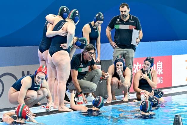 Carlo Silipo head coach of team Italy talks to the team during a time out of the Water polo, Wasserball women classification 7th 8th place match between team Canada (white caps) and team Italy (blue caps) of the 21st World Aquatics Championships at the Aspire Dome in Doha (Qatar), February 16, 2024. GiorgioXScala