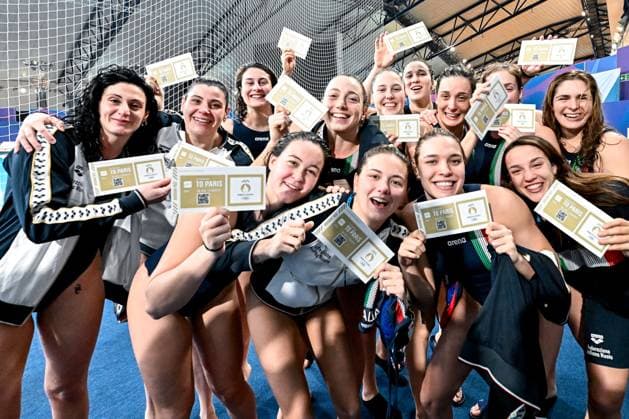 Athletes of team Italy celebrate the Olympic qualification after the Water polo, Wasserball women classification 7th 8th place match between team Canada (white caps) and team Italy (blue caps) of the 21st World Aquatics Championships at the Aspire Dome in Doha (Qatar), February 16, 2024. GiorgioXScala