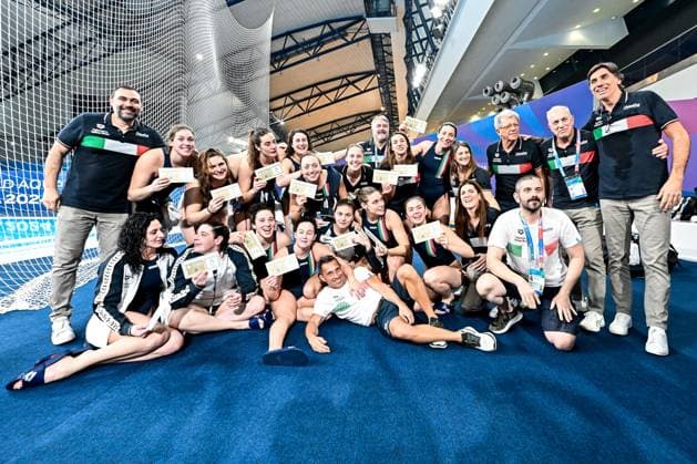 Members of team Italy celebrate the Olympic qualification after the Water polo, Wasserball women classification 7th 8th place match between team Canada (white caps) and team Italy (blue caps) of the 21st World Aquatics Championships at the Aspire Dome in Doha (Qatar), February 16, 2024. GiorgioXScala