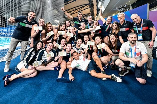 Members of team Italy celebrate the Olympic qualification after the Water polo, Wasserball women classification 7th 8th place match between team Canada (white caps) and team Italy (blue caps) of the 21st World Aquatics Championships at the Aspire Dome in Doha (Qatar), February 16, 2024. GiorgioXScala