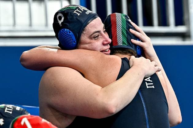 Members of team Italy celebrate the Olympic qualification after the Water polo, Wasserball women classification 7th 8th place match between team Canada (white caps) and team Italy (blue caps) of the 21st World Aquatics Championships at the Aspire Dome in Doha (Qatar), February 16, 2024. GiorgioXScala