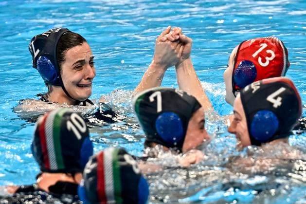 Members of team Italy celebrate the Olympic qualification after the Water polo, Wasserball women classification 7th 8th place match between team Canada (white caps) and team Italy (blue caps) of the 21st World Aquatics Championships at the Aspire Dome in Doha (Qatar), February 16, 2024. GiorgioXScala