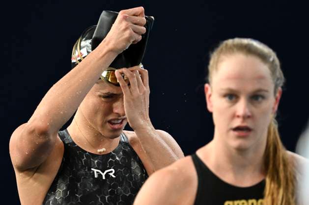 Katerine Savard of Canada reacts after competing in the swimming 50m Butterfly Women Heats during the 21st World Aquatics Championships at the Aspire Dome in Doha (Qatar), February 16, 2024. Deepbluemedia