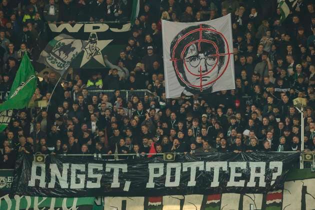 The fans of Hannover 96 show a poster with a crosshair and Harry Potter depicted in it, 2 Bundesliga, Hannover 96 vs SpVgg Greuther Fuerth, HDI Arena, 16 02 2024, Hannover, Germany