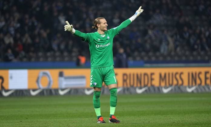 Goalkeeper Dominik Reimann celebrates after 0 1 by Baris Atik Joy Emotion Cheering Sport Football Soccer DFL 2 Bundesliga Men 22 Matchday Season 2023 2024 16 02 2024 Hertha BSC Berlin vs 1 FC Magdeburg FCM DFL regulations prohibit any use of photographs as image sequences and or quasi video