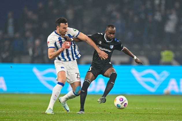 2 Bundesliga Hertha BSC Berlin 1 FC Magdeburg on 16 02 2024 at Olympiastadion in Berlin Haris Tabakovic Hertha BSC Berlin in a tackle against Silas Gnaka FC Magdeburg MT