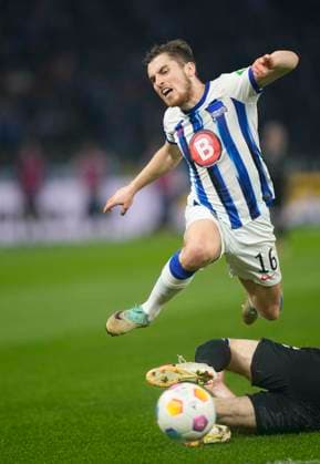 Germany, Berlin, 16 02 2024, Olympic Stadium, Hertha BSC vs 1 FC Magdeburg 2 Bundesliga, Jonjoe Kenny Hertha BSC and Jean Hugonet 1 FC Magdeburg battle for the ball Berlin Olympic Stadium Berlin Germany eu-images-659