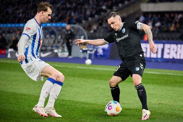 Baris Atik 1 FC Magdeburg, 23 , Pascal Klemens Hertha BSC, 41 , GER, Hertha BSC vs 1 FC Magdeburg, Soccer Men, 2 Bundesliga, Season 2023 2024, Matchday 22, 16 02 2024 DFL REGULATES PROHIBIT ANY USE OF PHOTOGRAPHS AS IMAGE SEQUENCES AND OR QUASI VIDEO GER, Hertha BSC vs 1 FC Magdeburg, Soccer men, 2 Bundesliga, Season 2023 2024, 22 Matchday, 16 02 2024 Berlin Copyright: xEibner-Pressefotox xClaudiusxRaux EP_CRH