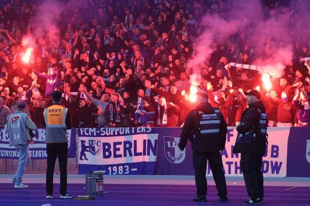 DEU, DFL, 2 FBL, Hertha BSC vs 1 FC Magdeburg, 16 02 2024, Berliner Olympiastadion, Berlin, DEU, DFL, 2 FBL, Hertha BSC vs 1 FC Magdeburg, im Bild Magdeburger Fanblock, Pyro DFL regulations prohibit any use of Photographs as image sequences and or quasi video Foto Juergen Engler nordphoto GmbH nordphotoxGmbHx xEngler nph00076