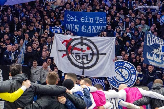 Soccer, Men, Season 2023 2024, 2 Bundesliga 22 Matchday , Hertha BSC 1 FC Magdeburg, Fans of Hertha with flag, DFL Logo in crosshairs, 16 02 2024, Copyright: xSebastianxRäppold MatthiasxKochx