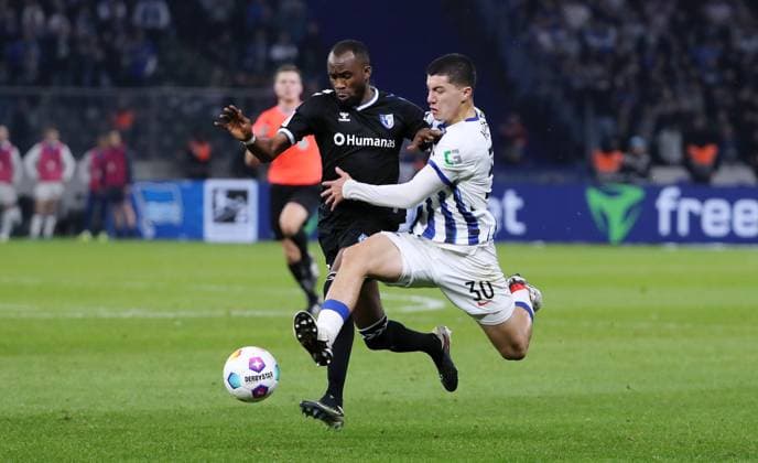 Silas Gnaka, Ibrahim Maza duel Match scene Action Sport Football Soccer DFL 2 Bundesliga Men 22 Matchday Season 2023 2024 16 02 2024 Hertha BSC Berlin vs 1 FC Magdeburg FCM DFL regulations prohibit any use of photographs as image sequences and or quasi video