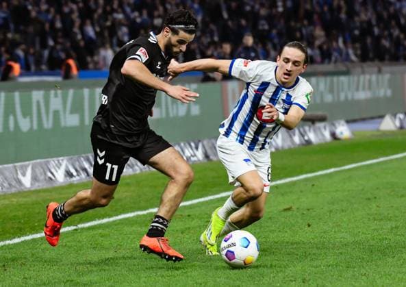 Soccer 2 Bundesliga, Hertha BSC 1 FC Magdeburg 16 02 2024, xdanx, Soccer 2 Bundesliga, Hertha BSC 1 FC Magdeburg, v l Mohammed El Hankouri 1 FC Magdeburg 11 ,Michal Karbownik Hertha BSC 6 ,duel, duel, fight, tackle DFL DFB REGULATIONS PROHIBIT ANY USE OF PHOTOGRAPHS as IMAGE SEQUENCES and or QUASI VIDEO Photo Daniel Lakomski Mix1 Berlin Olympiastadion Berlin Berlin Germany EN Copyright: xDanielxLakomskix