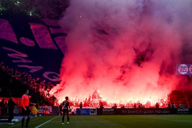 2 Bundesliga Hertha BSC Berlin 1 FC Magdeburg on 16 02 2024 at the Olympiastadion in Berlin Fans from Magdeburg light a Bengal fire MT