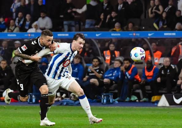 Soccer 2 Bundesliga, Hertha BSC 1 FC Magdeburg 16 02 2024, xdanx, Soccer 2 Bundesliga, Hertha BSC 1 FC Magdeburg, v l Luc Castaignos 1 FC Magdeburg 9 ,Pascal Klemens Hertha BSC 41 ,Zweikampf, duel, fight, tackle DFL DFB REGULATIONS PROHIBIT ANY USE OF PHOTOGRAPHS as IMAGE SEQUENCES and or QUASI VIDEO Photo Daniel Lakomski Mix1 Berlin Olympiastadion Berlin Berlin Germany EN Copyright: xDanielxLakomskix