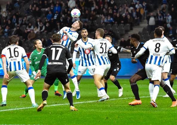 Soccer 2 Bundesliga, Hertha BSC 1 FC Magdeburg 16 02 2024, xdanx, Soccer 2 Bundesliga, Hertha BSC 1 FC Magdeburg, v l Jonjoe Kenny Hertha BSC 16 ,Dominik Reimann 1 FC Magdeburg 1 ,Linus Gechter Hertha BSC 44 ,Alexander Nollenberger 1 FC Magdeburg 17 ,Aymen Barkok Hertha BSC 18 ,Marton Dardai Hertha BSC 31 ,duel, duel, fight, tackle DFL DFB REGULATIONS PROHIBIT ANY USE OF PHOTOGRAPHS as IMAGE SEQUENCES and or QUASI VIDEO Photo Daniel Lakomski Mix1 Berlin Olympiastadion Berlin Berlin Germany EN Copyright: xDanielxLakomskix