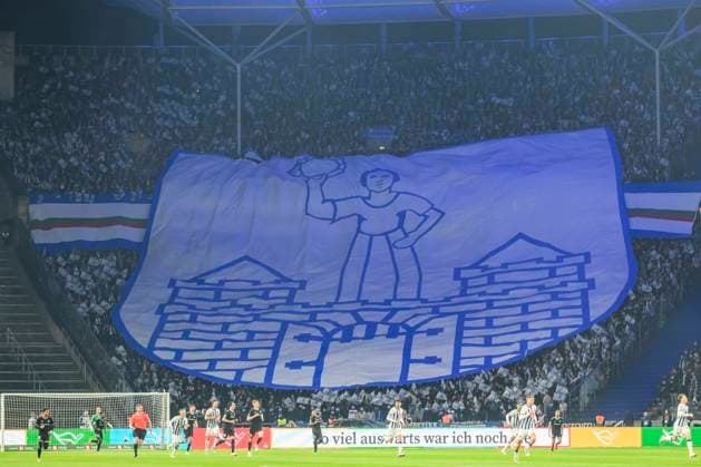 FCM flag in the fan curve, spectator stands, Hertha BSC 1 FC Magdeburg, 2 Bundesliga, football, DFB, 2023 2024 season, 22 match day, Olympia Stadion Berlin, DFB DFL REGULATIONS PROHIBIT ANY USE OF PHOTOGRAPHS AS IMAGE SEQUENCES AND OR QUASI VIDEO, 16 02 2024, Photo HMB Media Uwe Koch Copyright: HMBxMedia UwexKoch